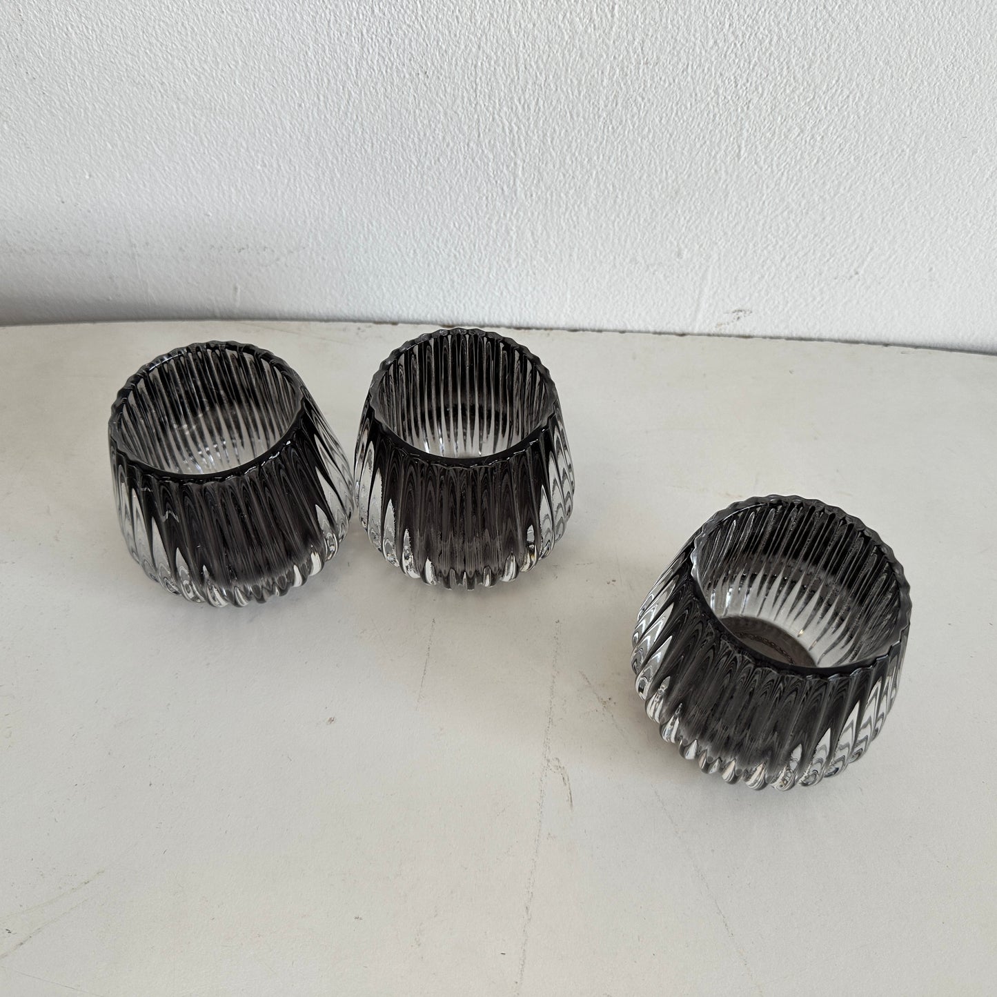 CA018 SET OF THREE FLUTED SMOKED GLASS VOTIVE CANDLE HOLDERS