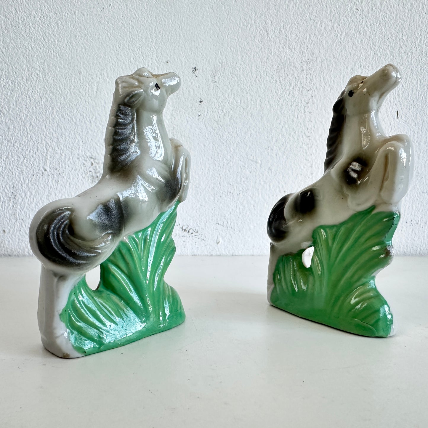 OB061 PAIR OF TINY JUMPING HORSES