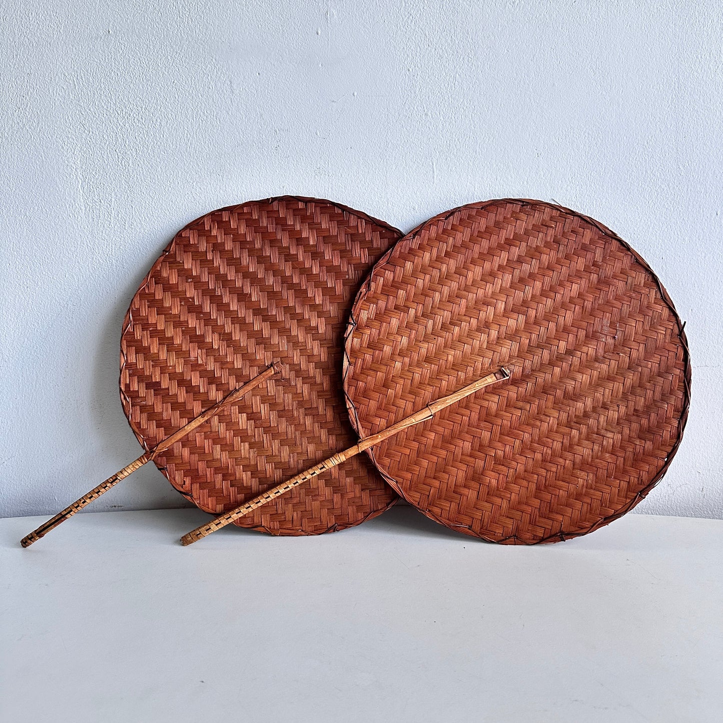 OB065 PAIR OF BAMBOO WOVEN HAND FANS