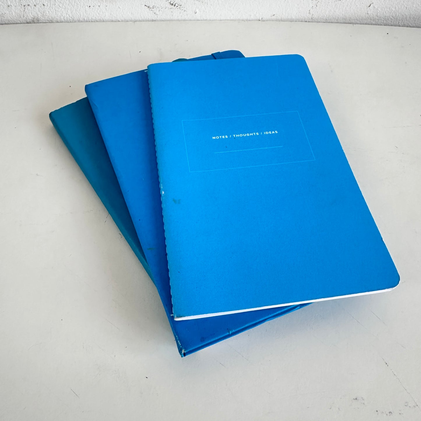 OF004 STACK OF 3 BLUE NOTEBOOKS