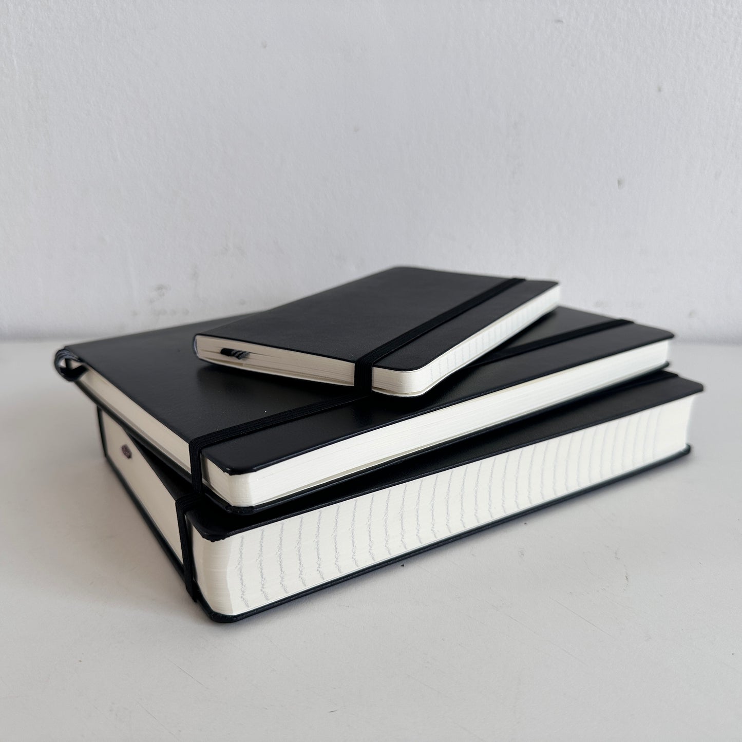 OF009 STACK OF 3 BLACK BOUND NOTEBOOKS