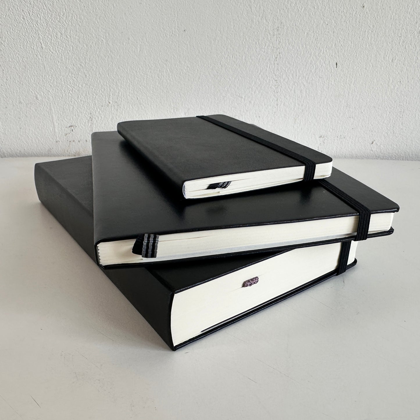OF009 STACK OF 3 BLACK BOUND NOTEBOOKS