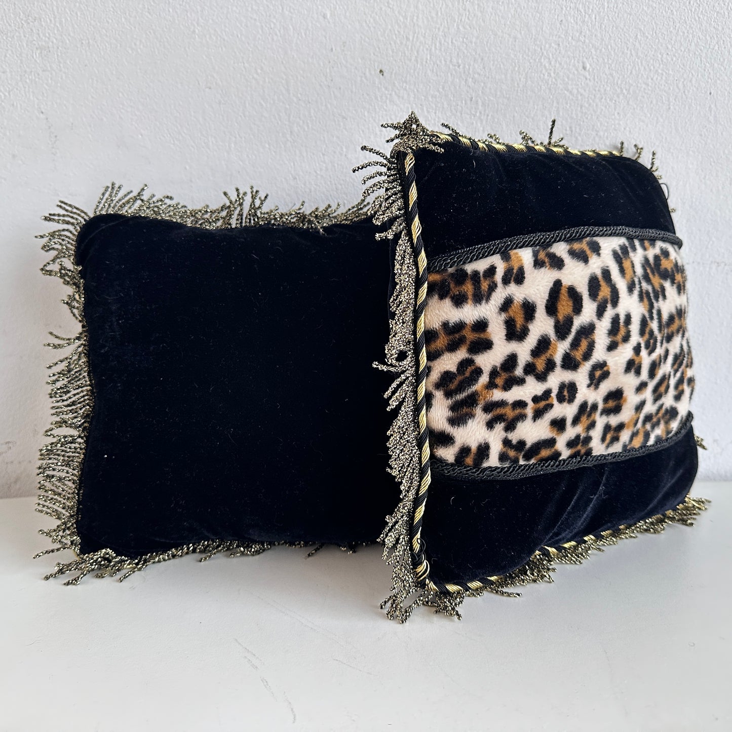 PW025 PAIR OF MINI BLACK & GOLD ANIMAL PRINT PILLOWS