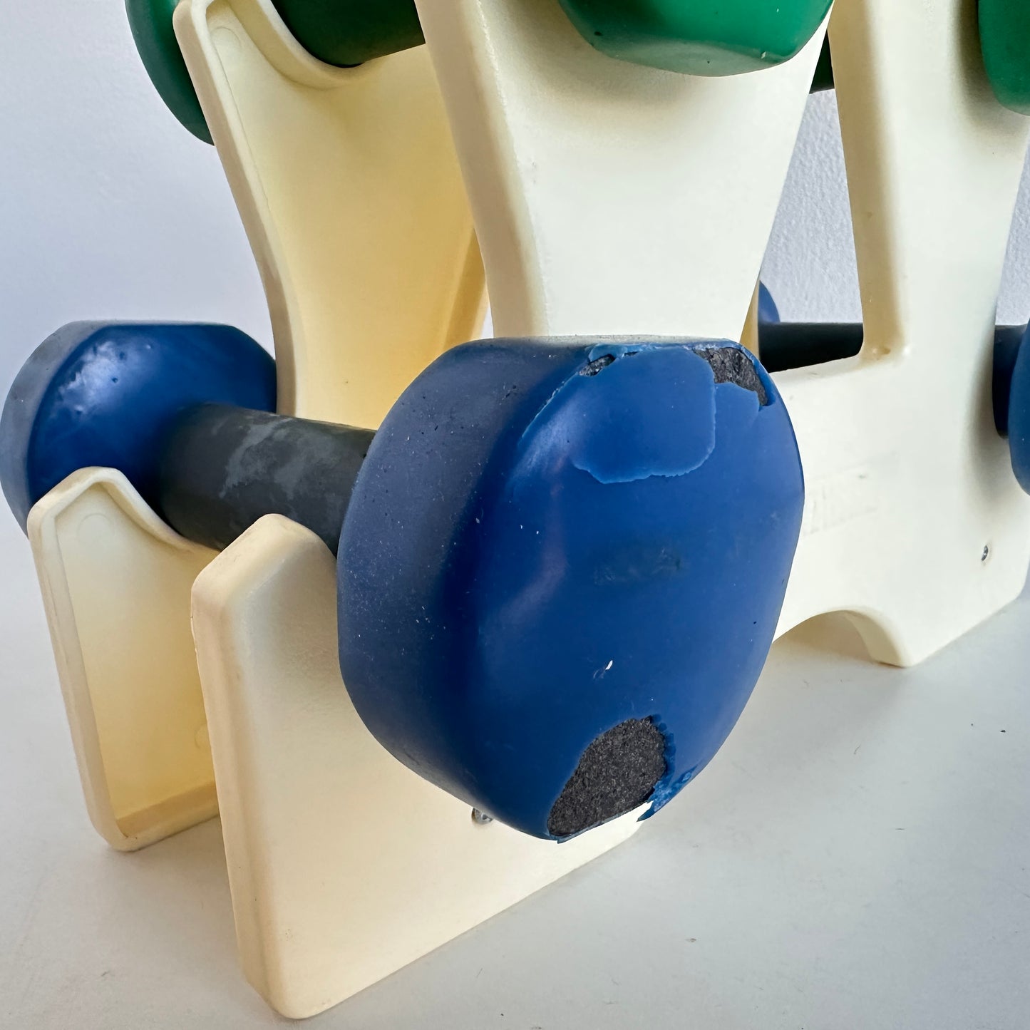 SP032 VINTAGE SPORTWORKS PURPLE, GREEN, AND BLUE DUMBBELLS WITH STAND
