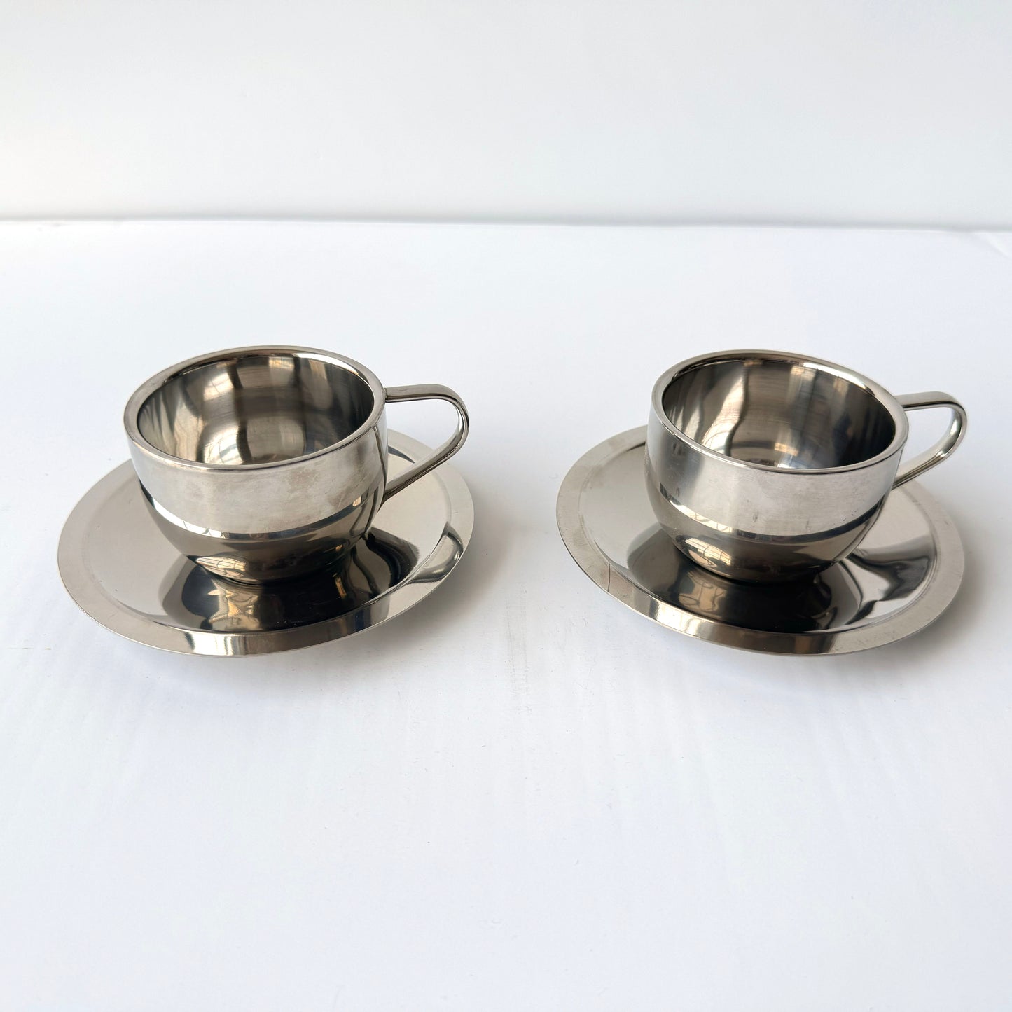 TT168 PAIR OF CHROME COFFEE CUPS