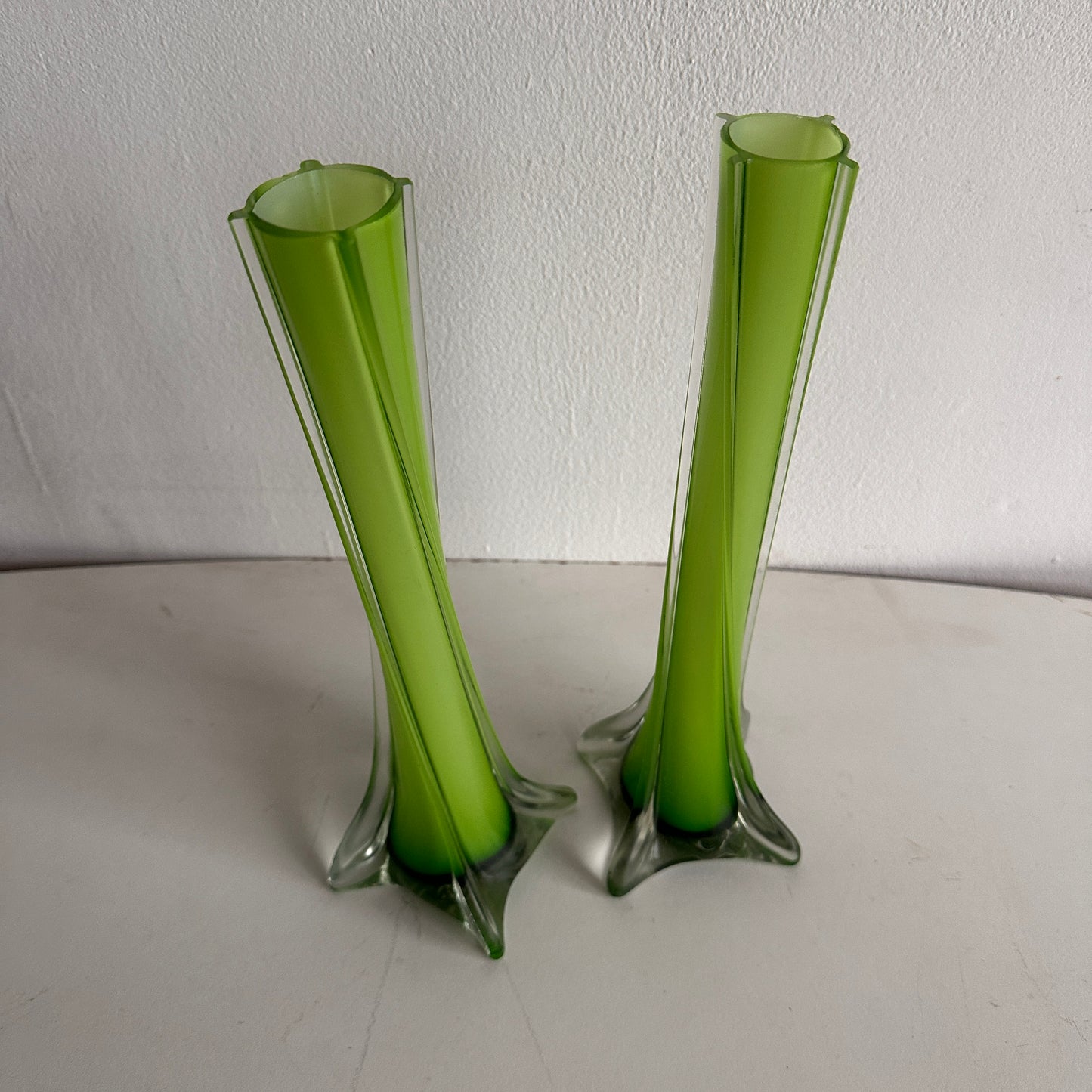 VS027 PAIR OF GREEN GLASS TWIZT VASES