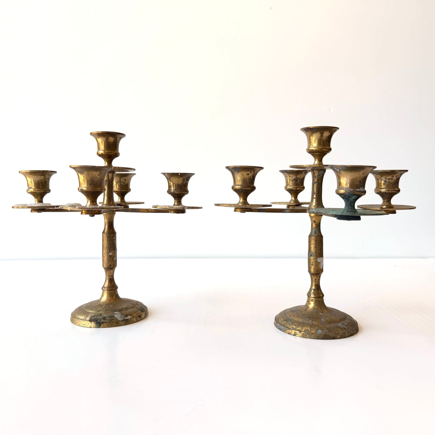 CA049 PAIR OF DISTRESSED BRASS CANDLE STICKS