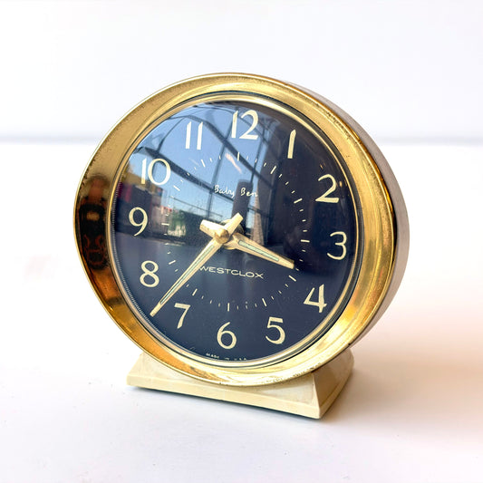 E100 BRASS AND CREAM ALARM CLOCK