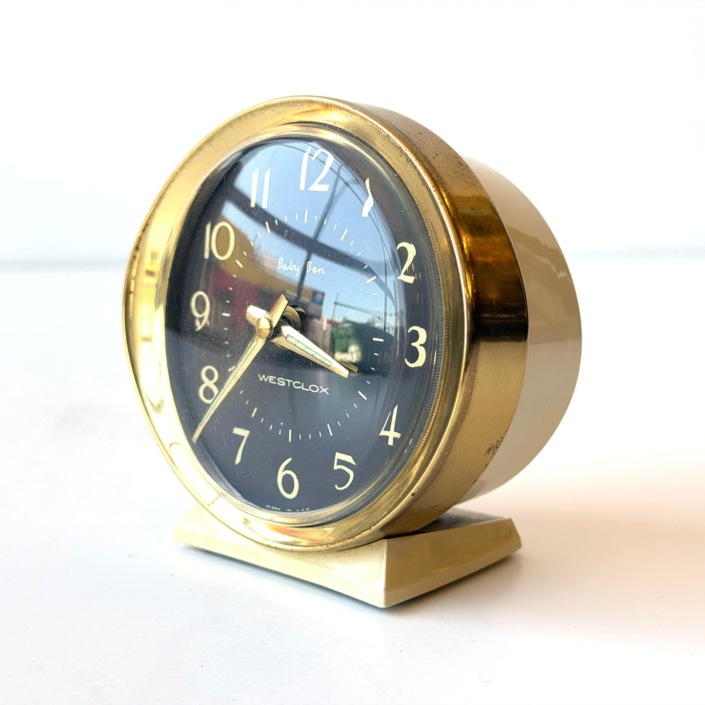 E100 BRASS AND CREAM ALARM CLOCK