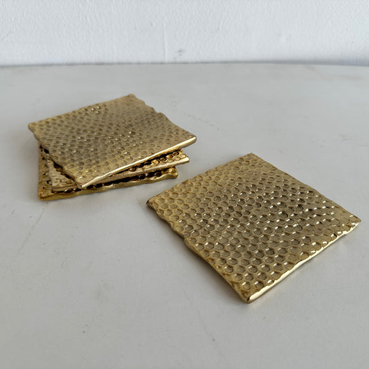 KT013 SET OF FOUR GOLD HONEYCOMB COASTERS
