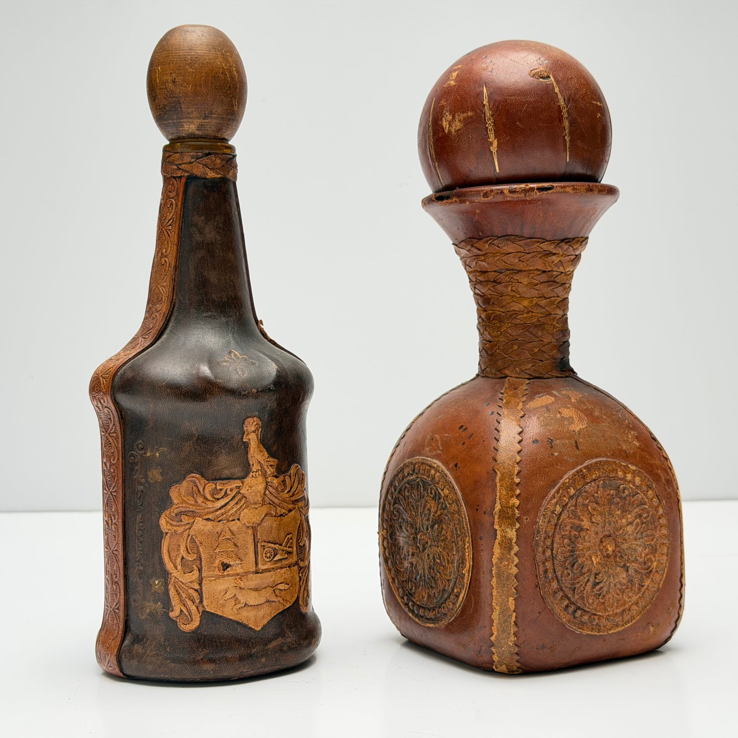 OB102 SET OF TWO LEATHER WRAPPED DECANTERS