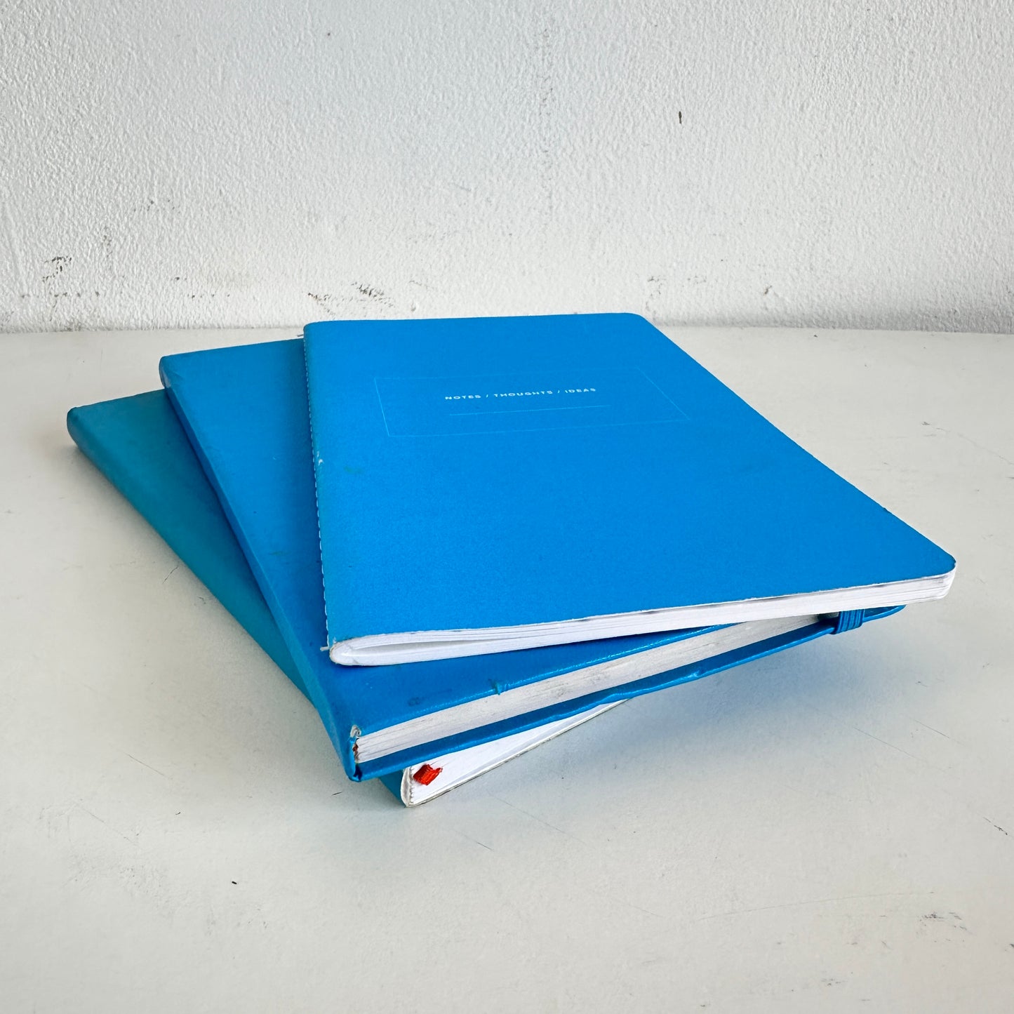 OF004 STACK OF 3 BLUE NOTEBOOKS