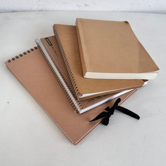 OF011 STACK OF 4 TAN NOTEBOOKS