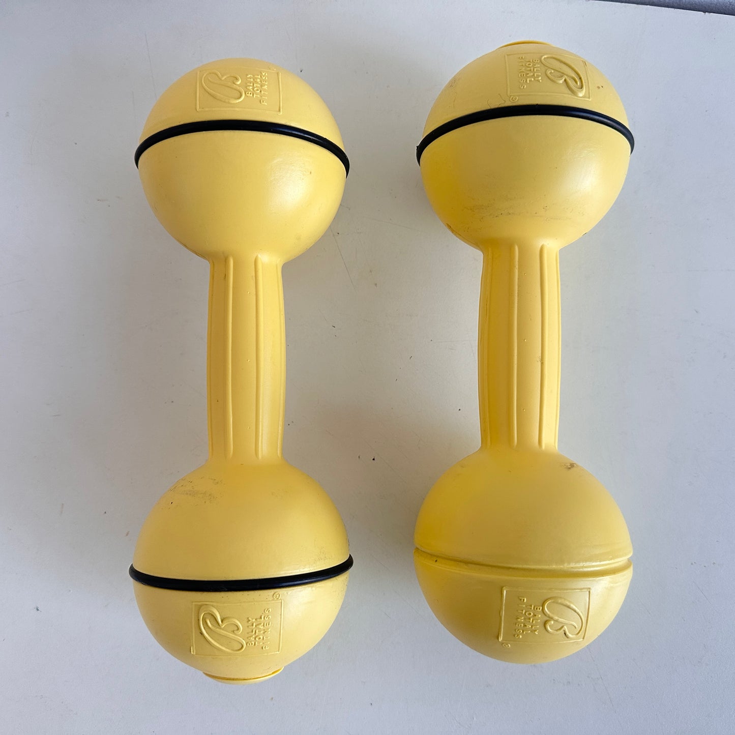 SP031 PAIR OF BALLY TOTAL FITNESS 5LB YELLOW DUMBBELLS