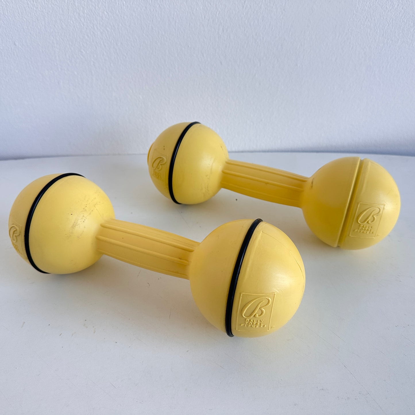 SP031 PAIR OF BALLY TOTAL FITNESS 5LB YELLOW DUMBBELLS