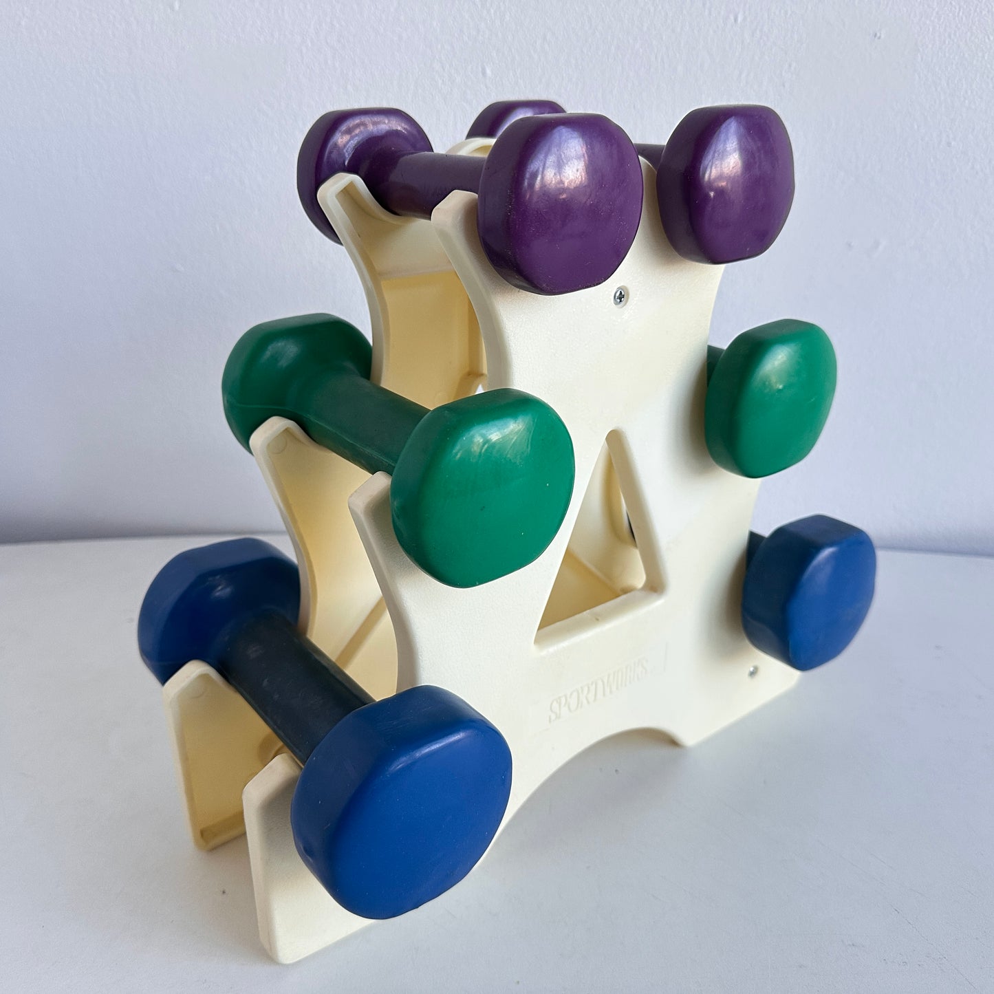 SP032 VINTAGE SPORTWORKS PURPLE, GREEN, AND BLUE DUMBBELLS WITH STAND
