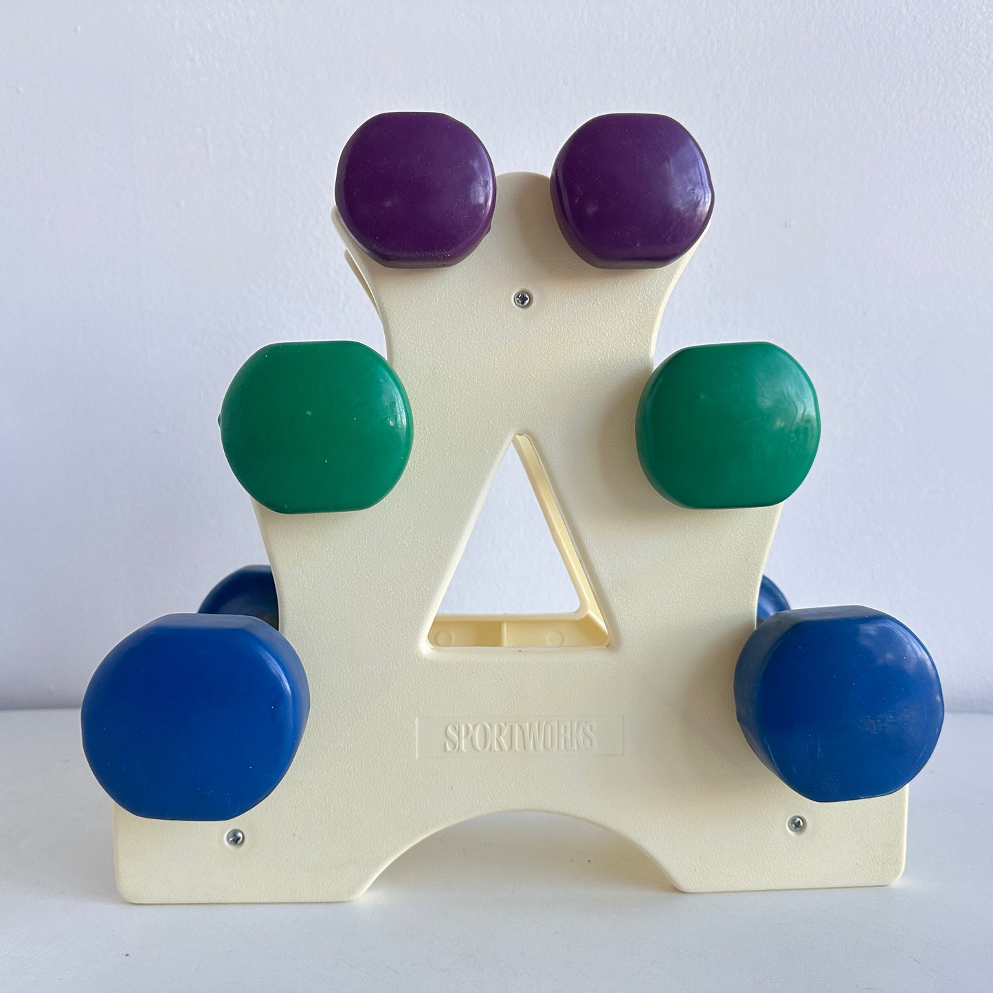 SP032 VINTAGE SPORTWORKS PURPLE, GREEN, AND BLUE DUMBBELLS WITH STAND