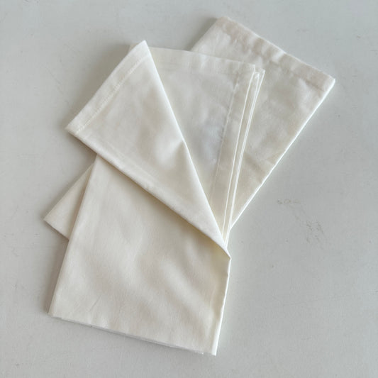 TL008 PAIR OF CREAM CB2 NAPKINS