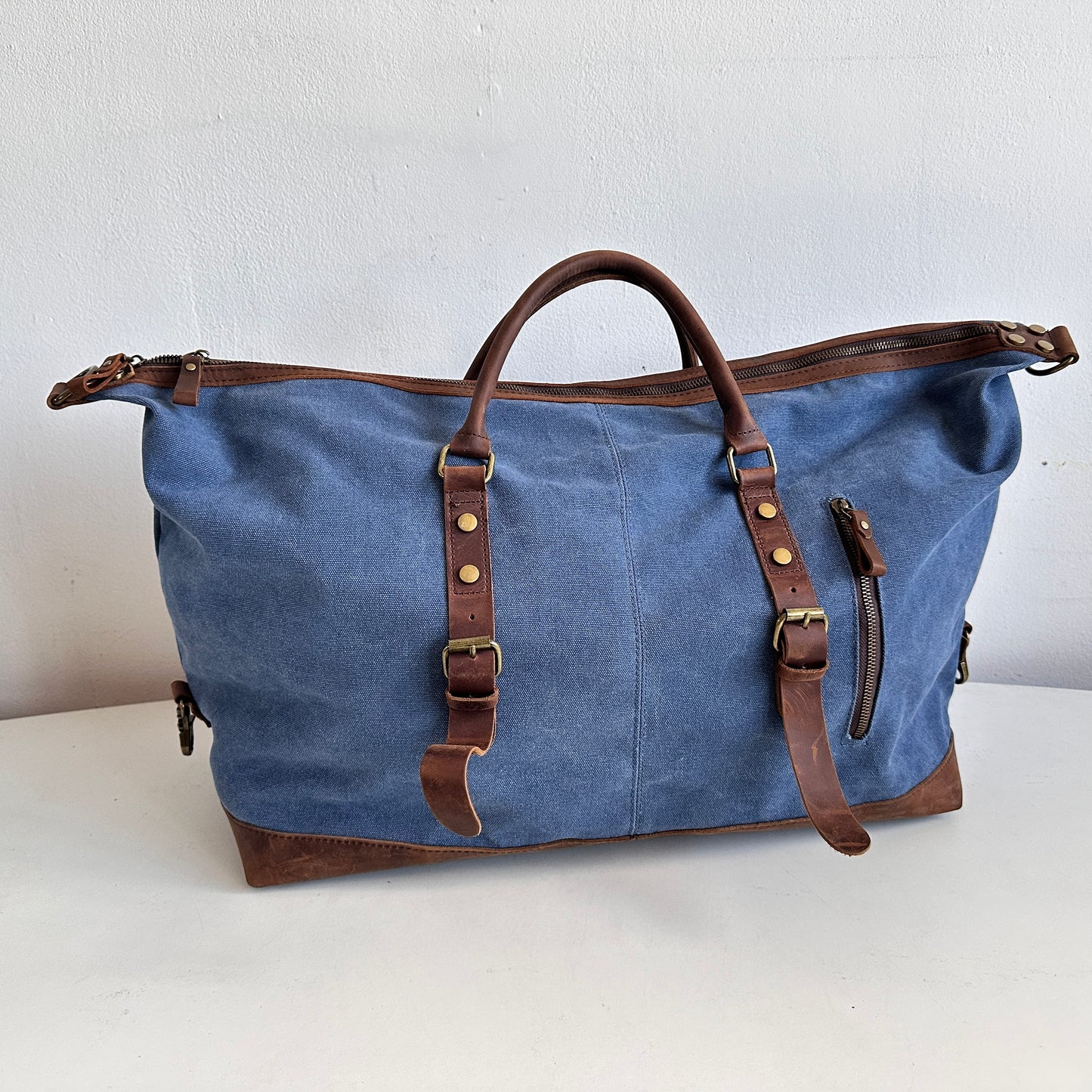 TL010 BLUE CANVAS AND BROWN LEATHER DUFFEL BAG