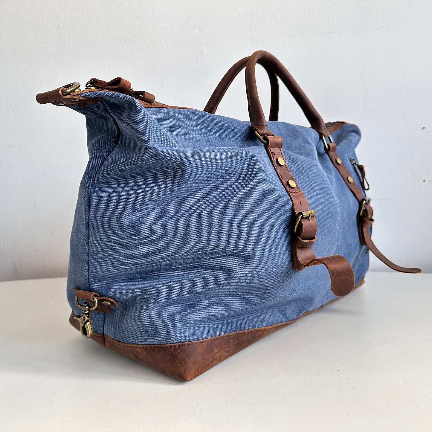 TL010 BLUE CANVAS AND BROWN LEATHER DUFFEL BAG