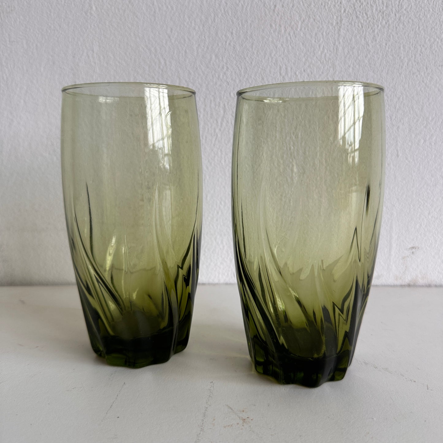 TT033 SET OF TWO TALL GREEN TINTED TWISTY WAVY GLASSES