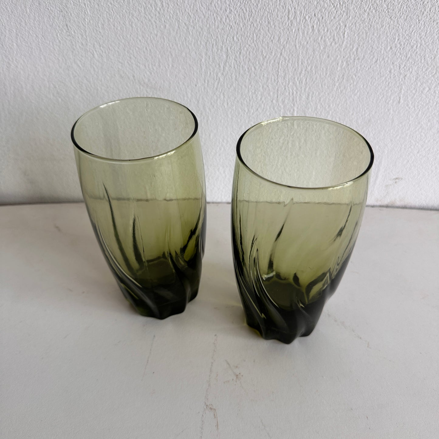 TT033 SET OF TWO TALL GREEN TINTED TWISTY WAVY GLASSES