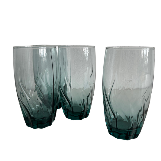TT034 SET OF FOUR TALL BLUE TINTED TWISTY WAVY GLASSES