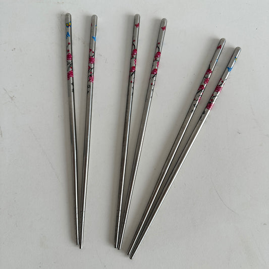 TT100 THREE PAIRS OF SILVER CHOPSTICKS WITH PINK FLOWERS AND BUTTERFLIES