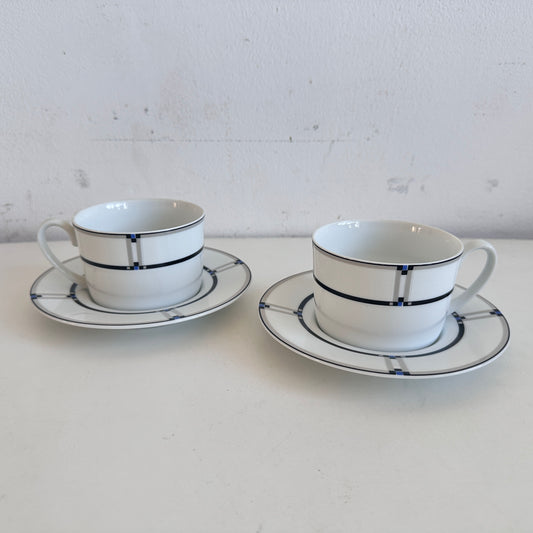 TT153 PAIR OF NOVA GEOMETRIC CUPS AND SAUCERS
