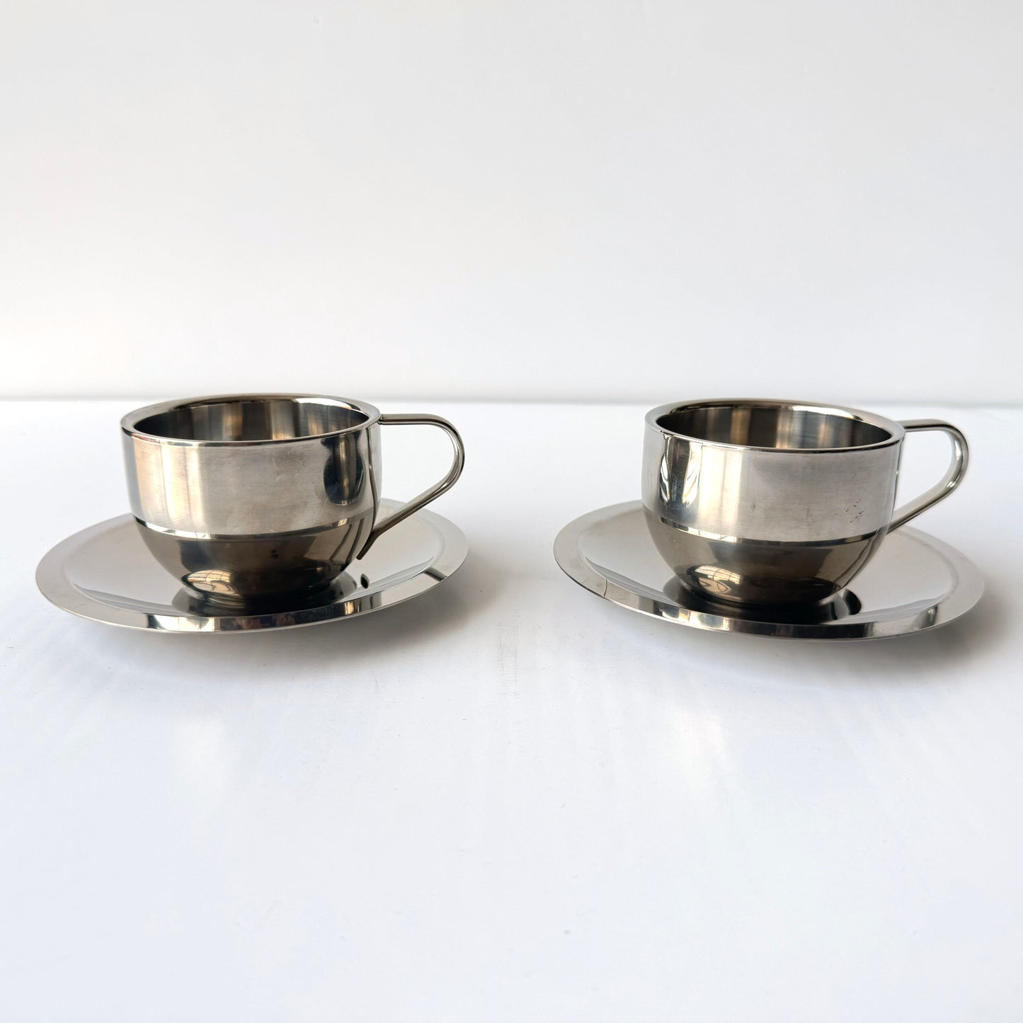TT168 PAIR OF CHROME COFFEE CUPS