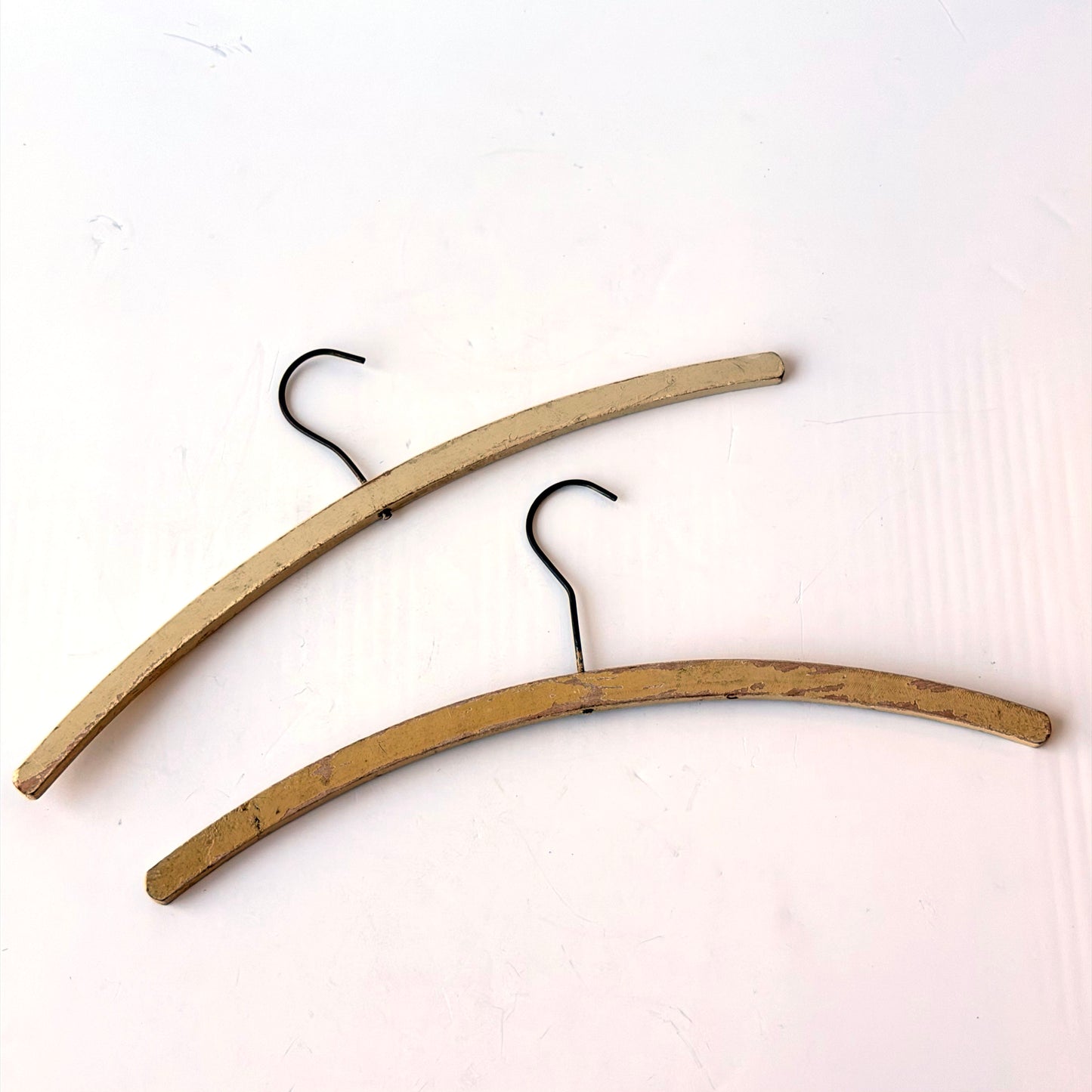 OB137 PAIR OF ANTIQUE CREAM CLOTHES HANGERS