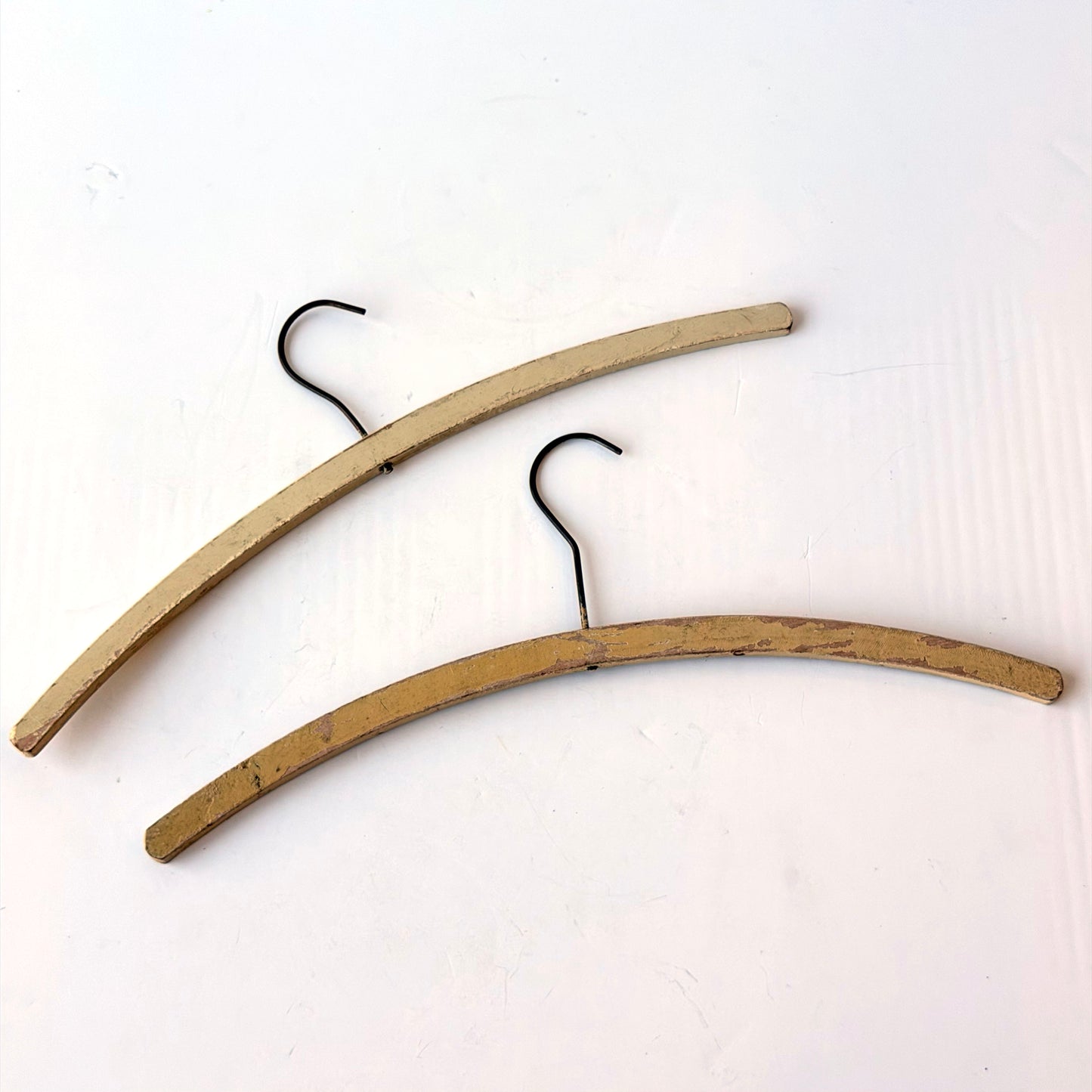 OB137 PAIR OF ANTIQUE CREAM CLOTHES HANGERS