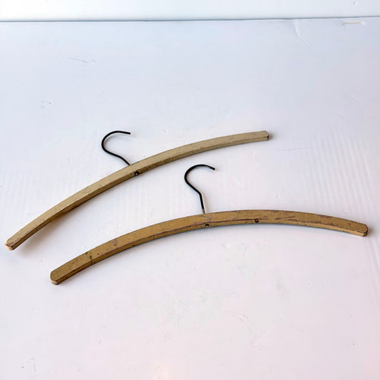OB137 PAIR OF ANTIQUE CREAM CLOTHES HANGERS