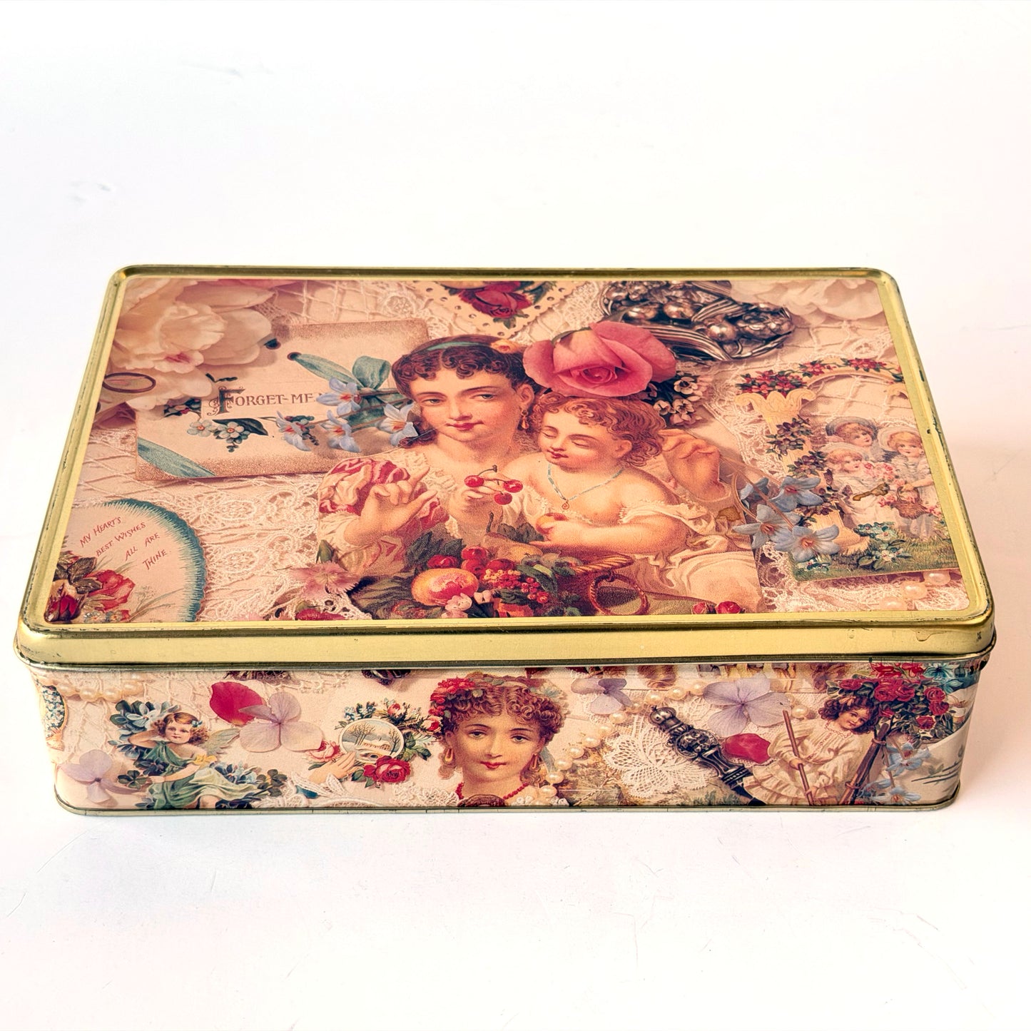OB142 FLORAL CHERUB TIN
