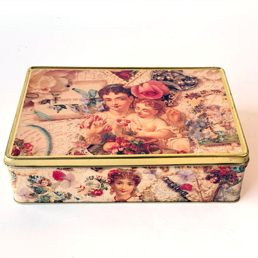 OB142 FLORAL CHERUB TIN